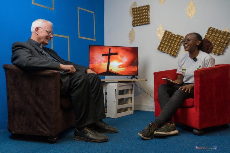 Bishop Matthias König and Presenter Peninah Wacera.